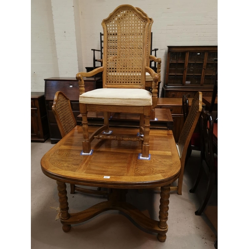 600 - A dining suite, American/English oak with Colonial style parquetry work, comprising table with round... 