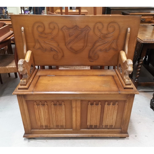 642 - An oak reproduction monks bench with box seat