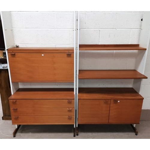 652 - A 1970's pair of full height wall units in teak and white laminate, by Beaver Tapley Ltd 