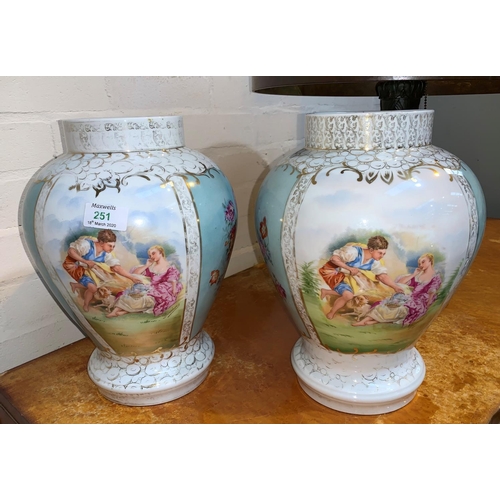 251 - A pair of Vienna style porcelain vases with panelled decoration after Bouchet, 32 cm (some hairline ... 