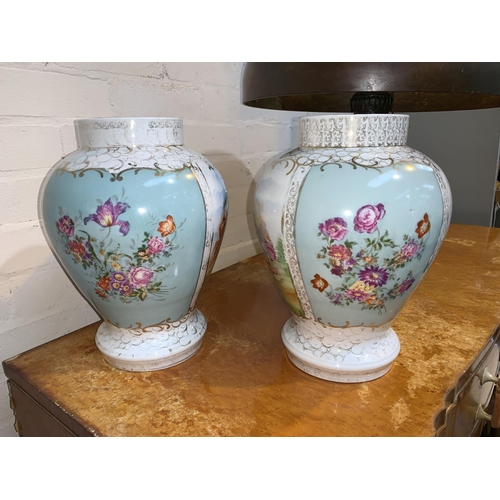 251 - A pair of Vienna style porcelain vases with panelled decoration after Bouchet, 32 cm (some hairline ... 