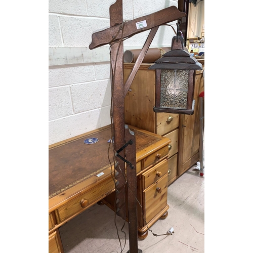 598 - A reproduction oak 'gallows'  standard lamp