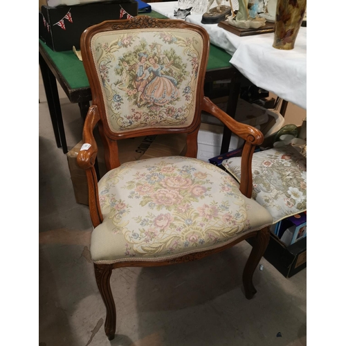 640 - A French style armchair with tapestry seat and back