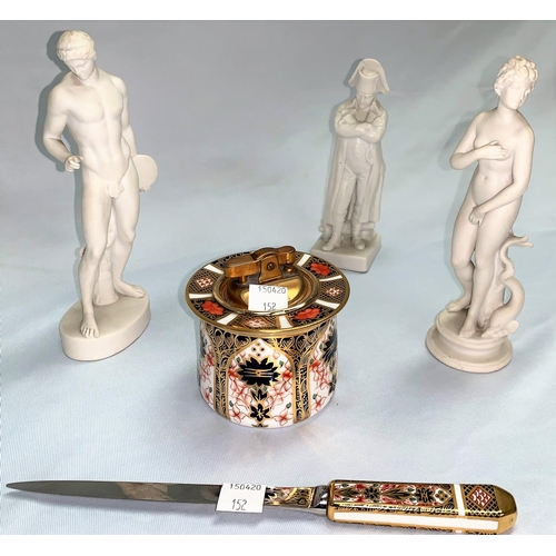 152 - Three white bisque figures; a Royal Crown Derby Imari pattern table lighter (hairline crack to base)... 