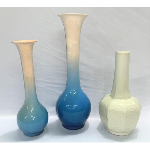 191 - A Chinese style octagonal vase of bulbous form with slender necks, in celadon; 2 similar Near/Far Ea... 