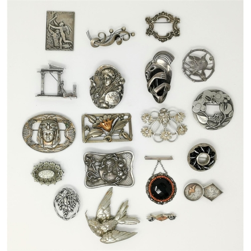 329 - A selection of decorative Art Nouveau period / style white metal brooches