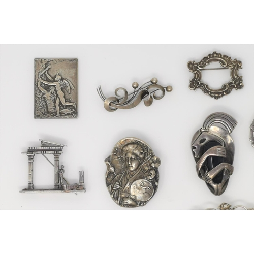 329 - A selection of decorative Art Nouveau period / style white metal brooches