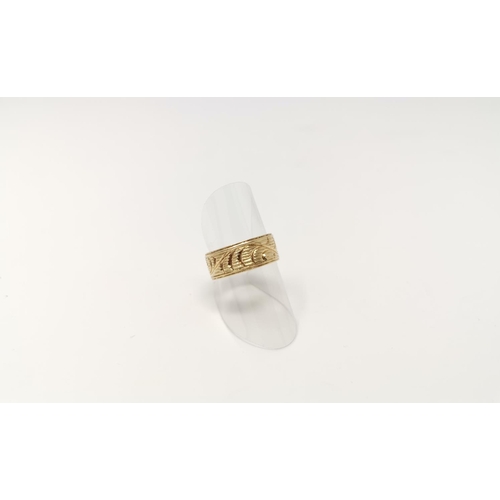 351 - A wide engraved wedding ring with internal inscription, unmarked, tests as 14 ct, 6.3 gm