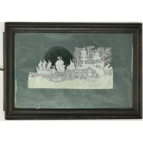 401 - A late 19th century  cut paper picture depicting ships at sea, 7 x 13.5 cm, with accompanying engrav... 
