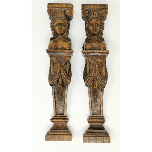428 - A pair of 19th century carved oak figural furniture mounts and decorative items and bric a brac