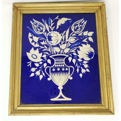 483 - A 19th century blue overlaid glass picture with cut floral decoration, 29 x 24 cm, gilt framed