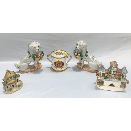 250 - A Victorian pair of china poodles with baskets of puppies; 2 encrusted ornaments; a Nao figure and 2... 