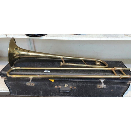 398 - A cased trombone