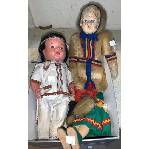 387 - A selection of vintage costume dolls including Inuit in seal skin etc