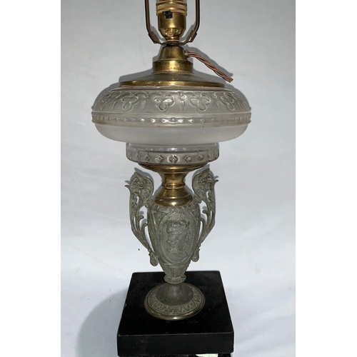 430 - A lamp base, classical design in cast metal and moulded glass, 40 cm (converted to electric light)