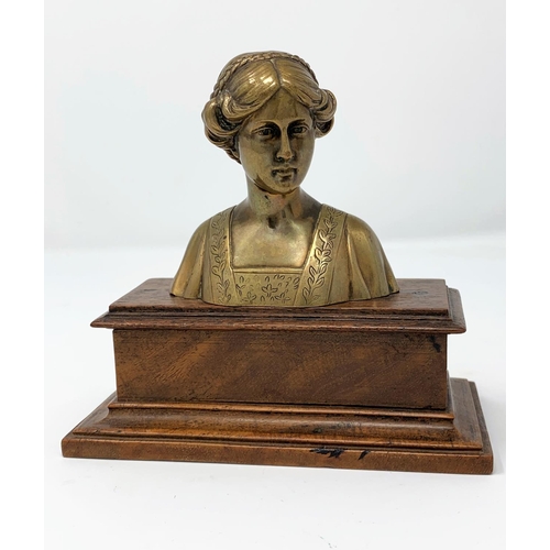 452 - A brass bust of Beatrice on wooden plinth, height 12 cm