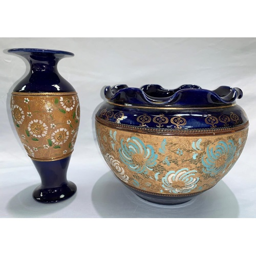 256 - A Royal Doulton stoneware jardinière, diameter 25 cm; a similar vase etc