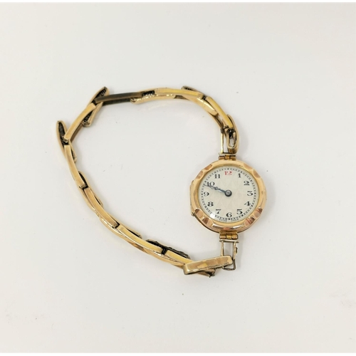 293 - A gold cased ladies wrist watch with gold plated bracelet