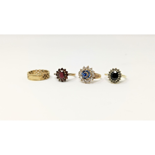 294 - Three 9ct gold dress rings , 2 with various coloured stones and a garnet set ring
