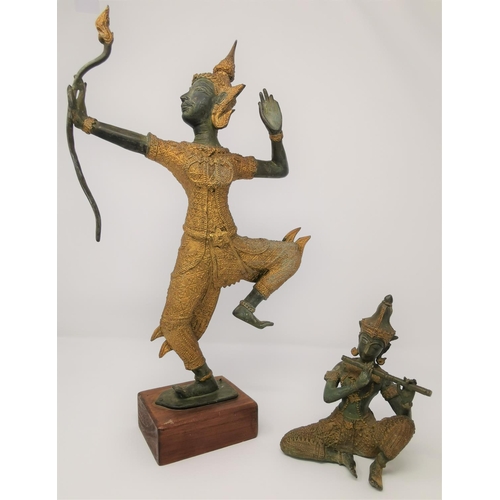 380 - A bronze and gilt oriental figure of a man with bow and a similar smaller figure of seated person pl... 