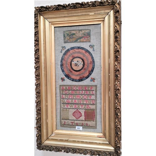 458 - A 19th century woolwork alphabet sampler mounted with other embroideries in a heavy gilt frame, 82 x... 
