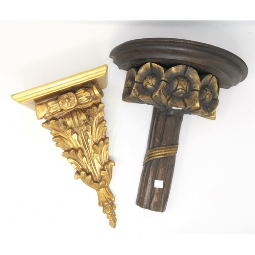 472 - A carved giltwood wall bracket, 35 cm; another; a similar wall shelf