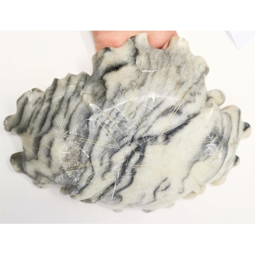 478 - A Chinese carved soapstone shallow dish of naturalistic form, 34 cm