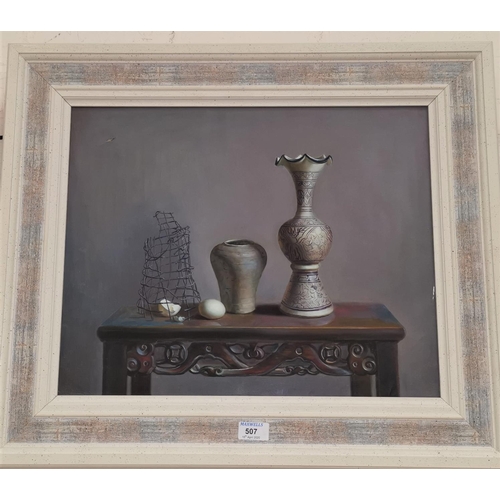 507 - A modern oil on canvas, still life with objects on a Chinese table, unsigned, 39 x 48 cm, framed