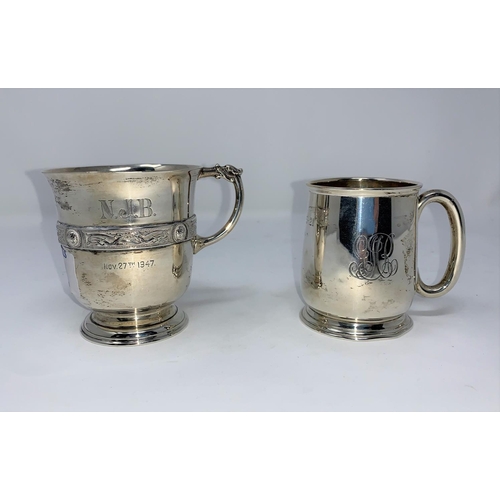 320 - A silver christening mug with Celtic band, monogrammed, London 1946; a similar plain mug, Birmingham... 