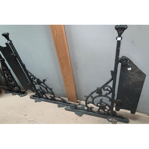 362A - A large pair of ornate Victorian cast iron wall brackets and similar bracket