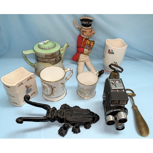 147 - A Royal Doulton Sairey Gamp teapot; 2 19th century presentation mugs; a vintage 'Holiday II 8mm cloc... 