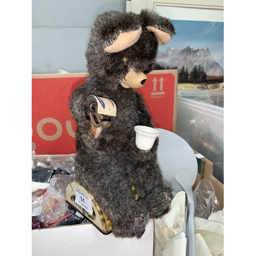 51 - A vintage battery operated bear drinking Pepsi Cola; a selection of dolls clothing accessories and b... 