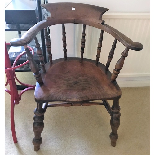 564B - A 19th century elm and beech smoker's bow armchair