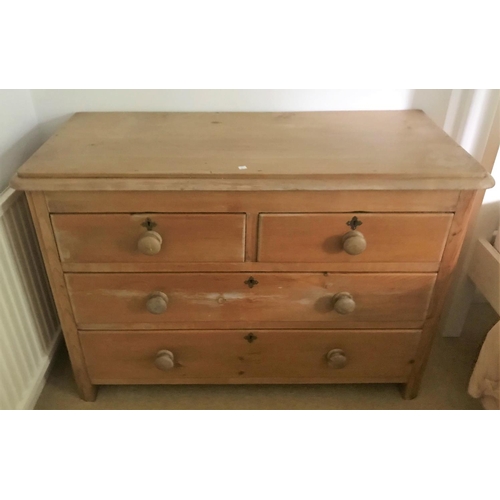 565a - A Victorian pine chest of 2 long and 2 short drawers