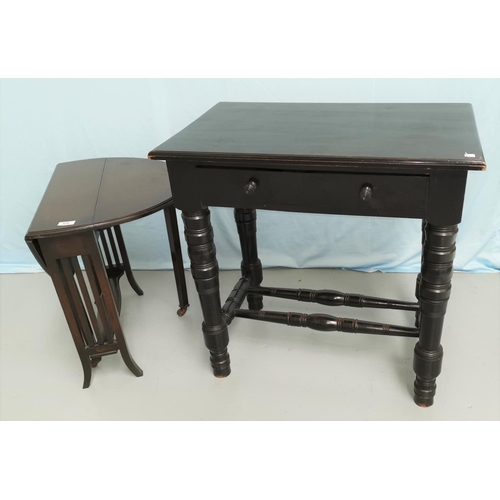 576 - An oak Sutherland drop leaf table with oval top; an Edwardian ebonised side table on turned legs