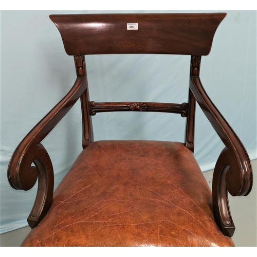 586 - A Regency mahogany carver chair with wide top rail and scroll arms, on turned fluted legs