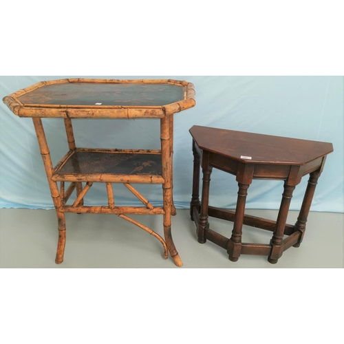 591 - A Victorian 2 tier occasional table in black lacquer and bamboo, with canted rectangular top; an oak... 