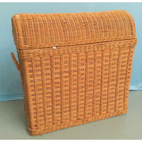 597 - A woven cane linen basket with dome top