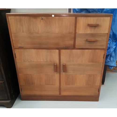 681 - A 1960's side cabinet with fall front; various cupboards