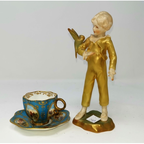 259A - A Royal Worcester figure, 'The Parakeet'; a Coalport cabinet cup and saucer with hand painted vignet... 