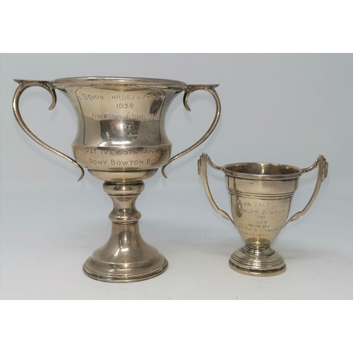 270 - A hall marked silver double handled trophy (both with presentation inscription) Birmingham 1936 and ... 