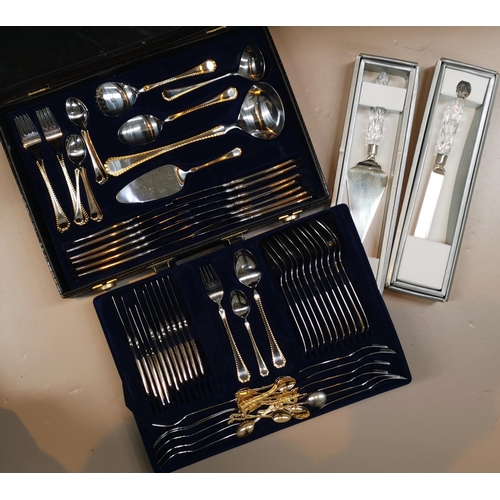 310 - An Amefa deluxe canteen of cutlery, stainless steel and gilt, in fitted attaché case