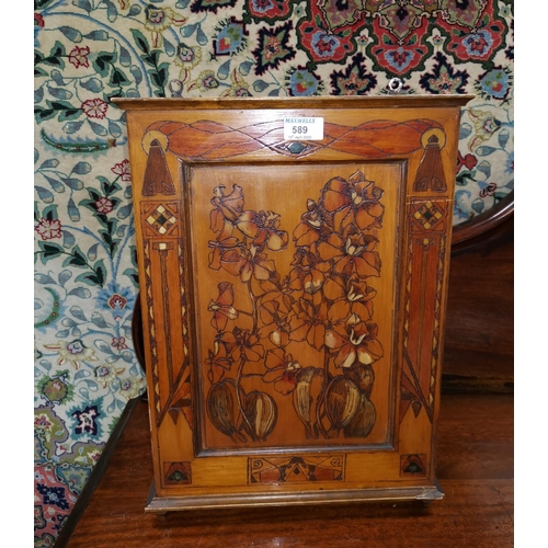 589 - An Edwardian small pine wall cupboard with pokerwork decoration, enclosed by single door, height 49 ... 