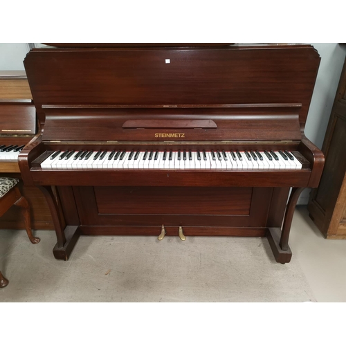631A - A small modern mahogany cased iron framed overstrung piano by STEINMETZ