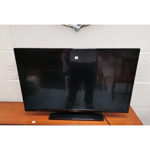 688 - A Panasonic flat screen TV, Roberts radio etc