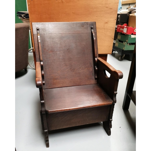 690 - An early 19th century oak monk’s chair