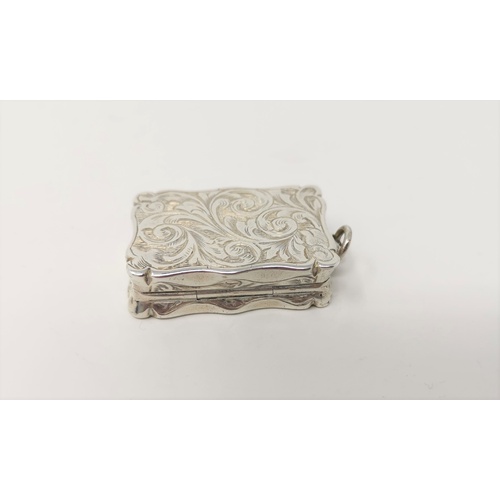 315 - A Victorian silver shaped rectangular vinaigrette with chased decoration, pierced gilded internal gr... 