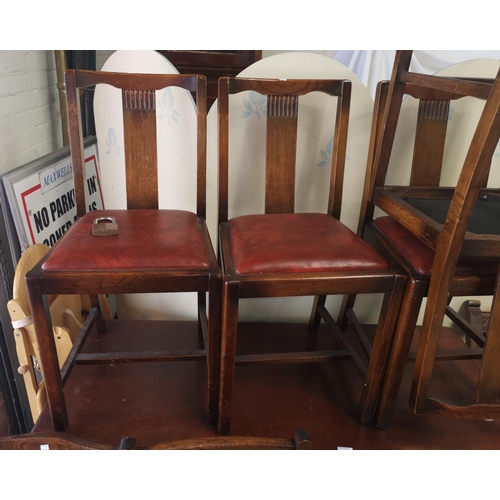 569A - A set of four 1930's oak dinning chairs