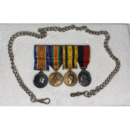 234 - A group fo 4 miniture medals including 2 Territorial Force medals awarded to sergeant Major D E BUCK... 