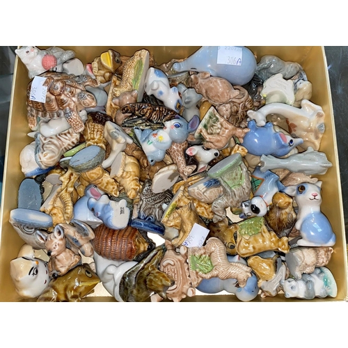 305a - A selection of Wade Whimsies and Disney figures; a selection of Royal Commemorative and decorative c... 